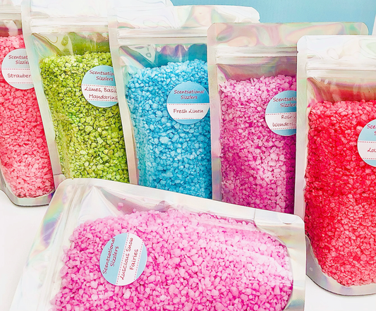 Six pouches of sizzler granules in bright colours.